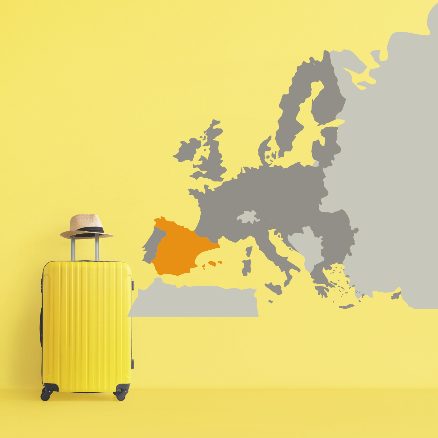 Spain flag on yellow suitcase